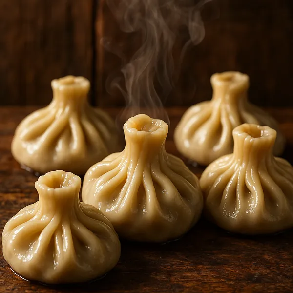 Discover a puzzle with steaming, hand-folded dumplings arranged on a warm wooden surface.