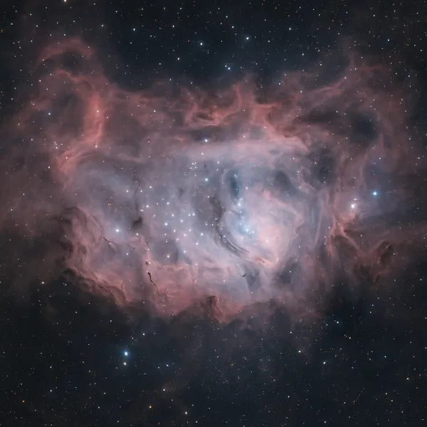 Discover a puzzle with a sweeping cosmic nebula glowing in soft pinks and cool blues against a star-speckled black sky.