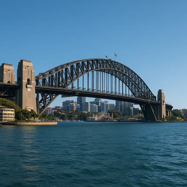 Discover a puzzle with a sweeping steel-arch bridge spanning a calm blue harbor against a clear sky, framed by soft beige stone towers and a distant city skylin