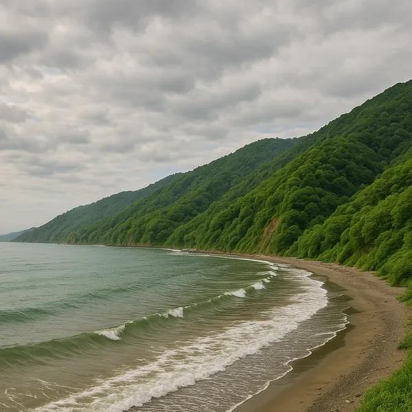 Enjoy an online jigsaw puzzle designed for browser play, featuring a tranquil coastal nature scene where green hills meet a deserted shoreline.