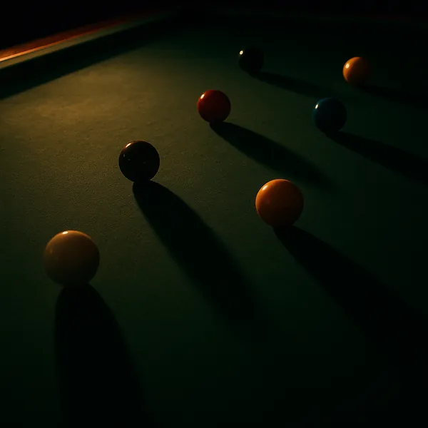 Enjoy an online jigsaw puzzle designed for browser play, featuring a moody billiards scene with colorful pool balls scattered across a deep green table.