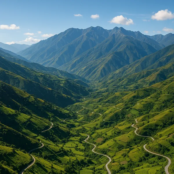 Enjoy an online jigsaw puzzle designed for browser play, featuring a sweeping mountain landscape with winding roads that draw the eye through lush valleys.