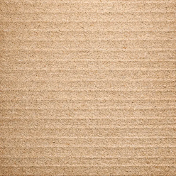 Enjoy an online jigsaw puzzle designed for browser play, featuring a close-up view of corrugated cardboard that highlights its simple, tactile texture.