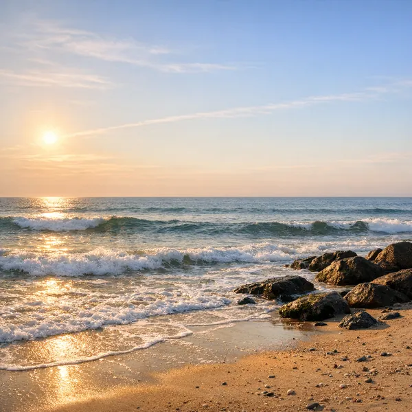Enjoy an online jigsaw puzzle designed for browser play, featuring a tranquil beach at sunset that celebrates nature and seaside calm.