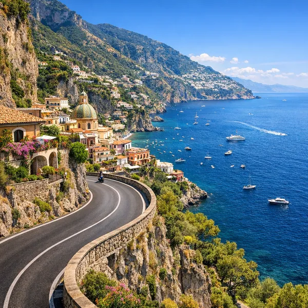 Enjoy an online jigsaw puzzle designed for browser play, featuring a picturesque coastal town where sea and cliffside architecture meet.
